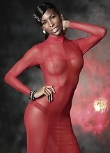 Black Natassia posing in red dress